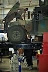 Airmen from the 5th Logistics Readiness Squadron maintain a Humvee in the Defender Dome at Minot Air Force Base, N.D., July 28, 2016. The 91st Security Support Squadron is specifically responsible for preventative maintenance inspections and troubleshooting, and everything from electrical repair to transmission replacement, on armored Humvees and Bearcats. (U.S. Air Force photos/Airman 1st Class J.T. Armstrong)