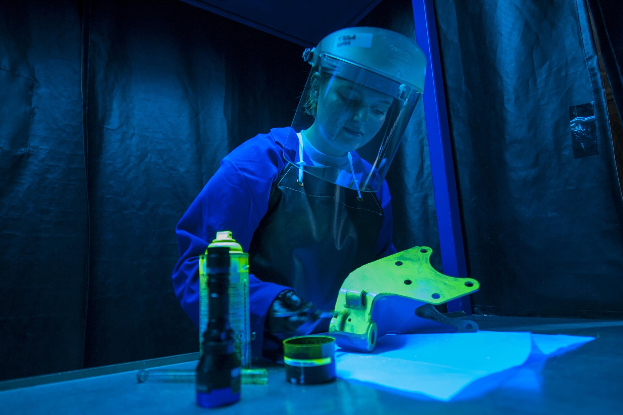 U.S. Air Force Airman Teanna Pafford, 23d Equipment Maintenance Squadron non-destructive inspection apprentice, brushes a penetrating chemical onto an aircraft part, July 29, 2016, at Moody Air Force Base, Ga. Airmen in the NDI unit are able to find equipment defects the eye can't see using x-rays and ultrasonic equipment.