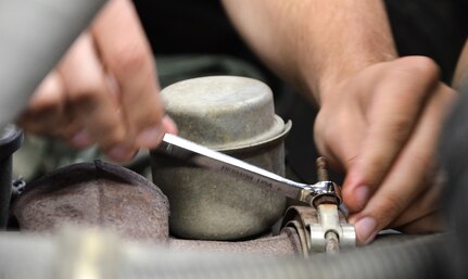 As part of his U.S. Army Reserve Annual Training participation in the 88th Regional Support Command's Operation Platinum Support mission, Pfc. Walter John Solt IV, 698th Quartermaster Company mechanic, gets wrench time doing repairs and troubleshooting to enhance his MOS capabilities. Operation Platinum Support allows Army Reserve Soldiers in low-density supply and maintenance specialties to perform and gain proficiency in their technical skills while acting in direct support to the numerous exercises taking place on Fort McCoy.