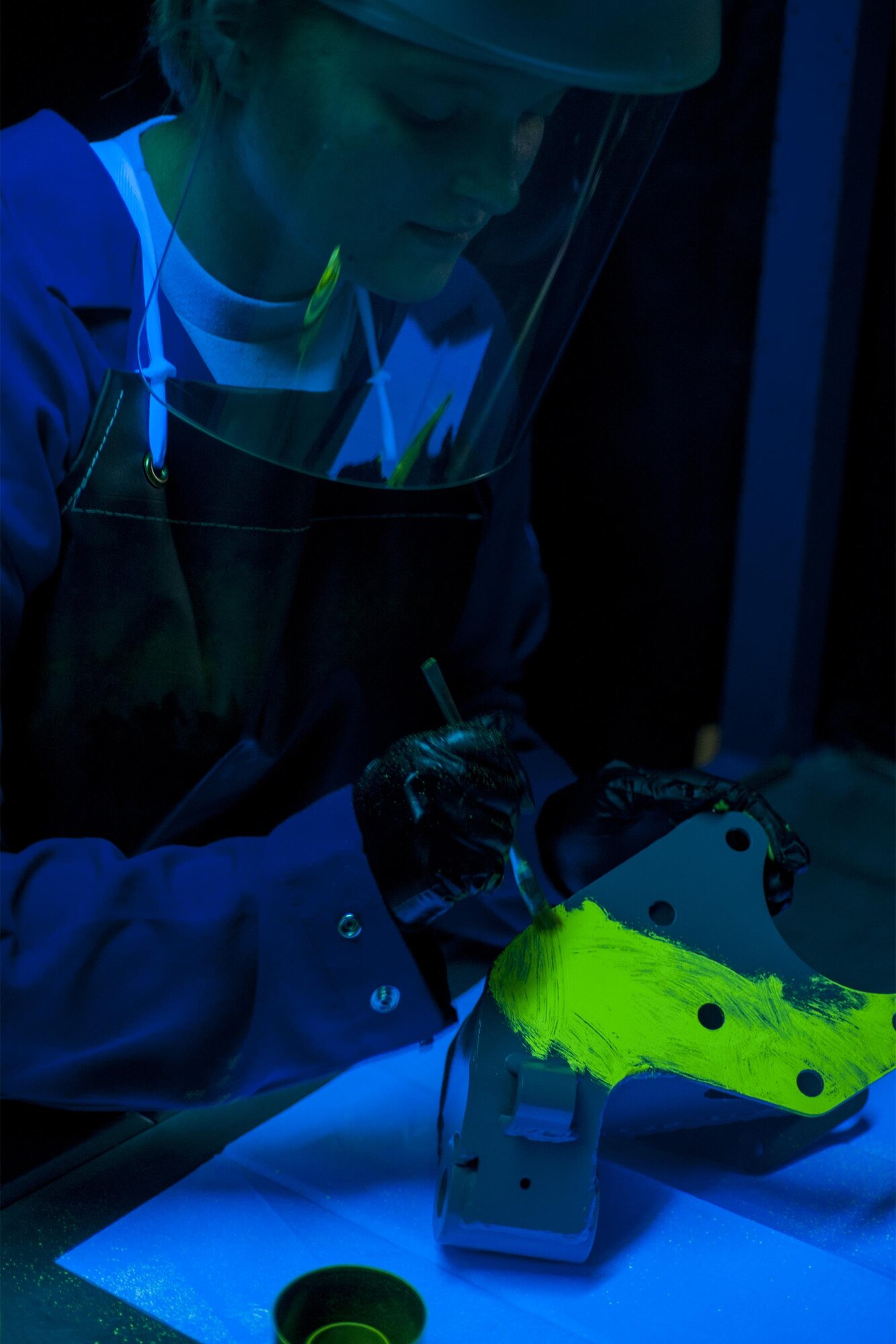 U.S. Air Force Airman Teanna Pafford, 23d Equipment Maintenance Squadron non-destructive inspection apprentice, brushes a penetrating chemical onto an aircraft part, July 29, 2016, at Moody Air Force Base, Ga. NDI technicians use chemicals that illuminate cracks and defects on aircraft parts. (U.S. Air Force photo by Airman Daniel Snider)