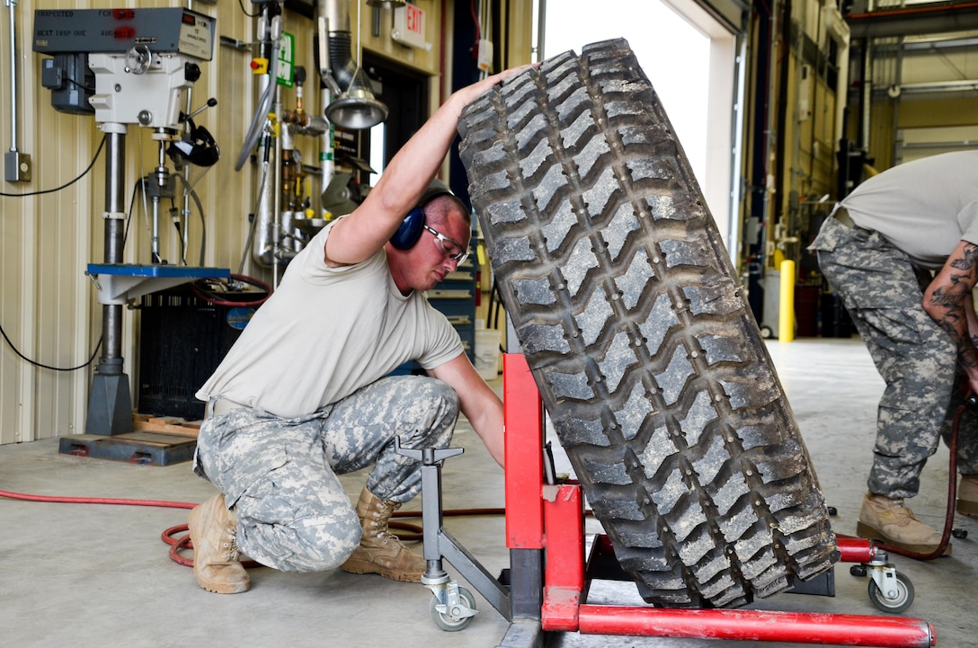 As part of his U.S. Army Reserve Annual Training participation in the 88th Regional Support Command's Operation Platinum Support mission, Sgt. Bryant Vannoy with the 298th Support Maintenance Company out of Altoona, Pa., removes the wheel of a FMTV for annual service and maintenance at the 88th RSC’s Equipment Concentration Site 67 on Fort McCoy, July 28. Operation Platinum Support allows Army Reserve Soldiers in low-density supply and maintenance specialties to perform and gain proficiency in their technical skills while acting in direct support to the numerous exercises taking place on Fort McCoy.