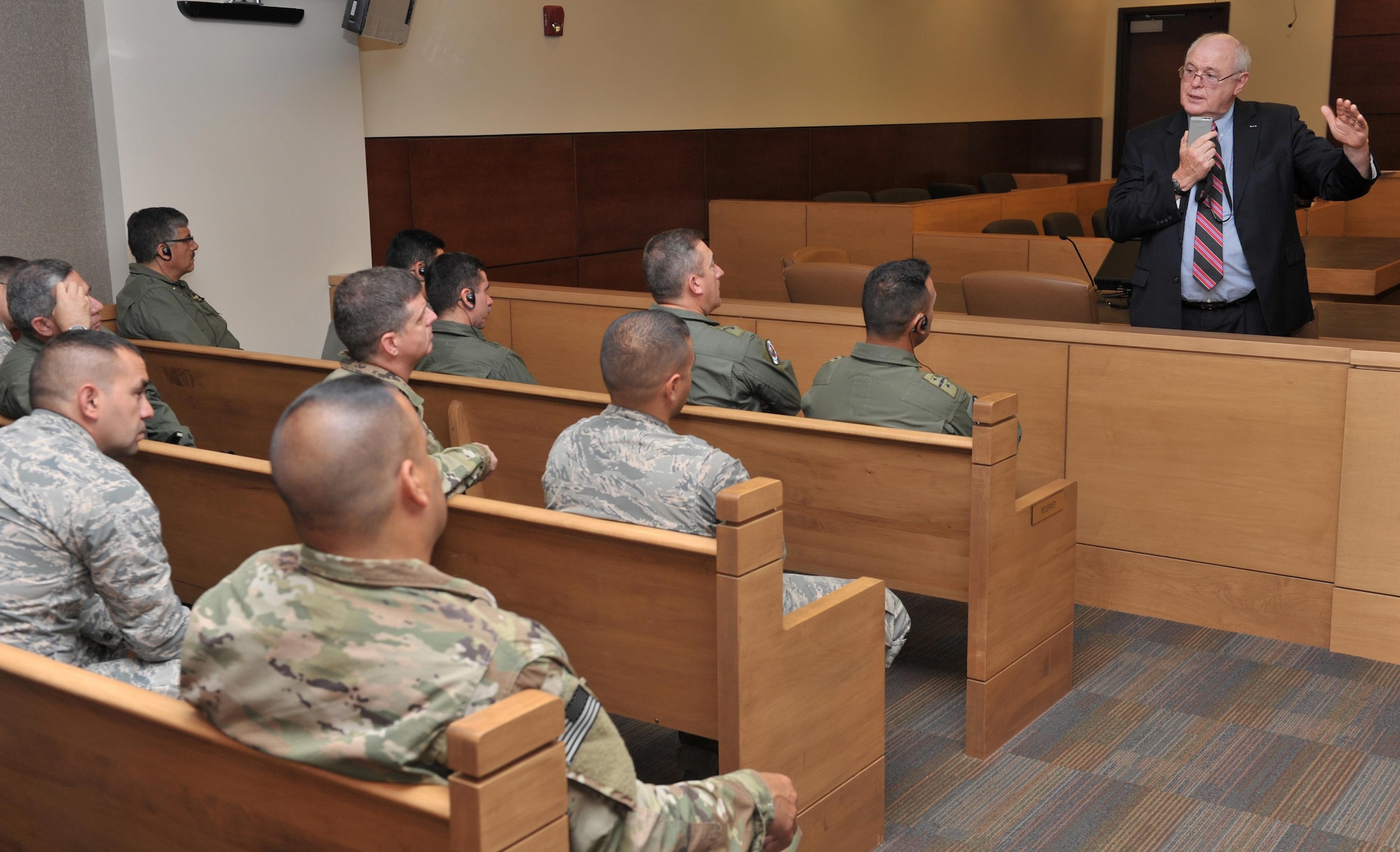 Judge Patt Maney, the county judge for Okaloosa County Court of Florida, explains the U.S. justice system to Building Partnership Aviation Capacity Seminar attendees at Ft. Walton Beach, Fla.,July 19, 2016. BPACS is a two-week long event, held four times a year, which brings aviation-minded foreign military personnel together with U.S. civilains and military membbers to learn about aviation enterprise and security. (U.S. Air Force photo by Staff Sgt. Kentavist P. Brackin)