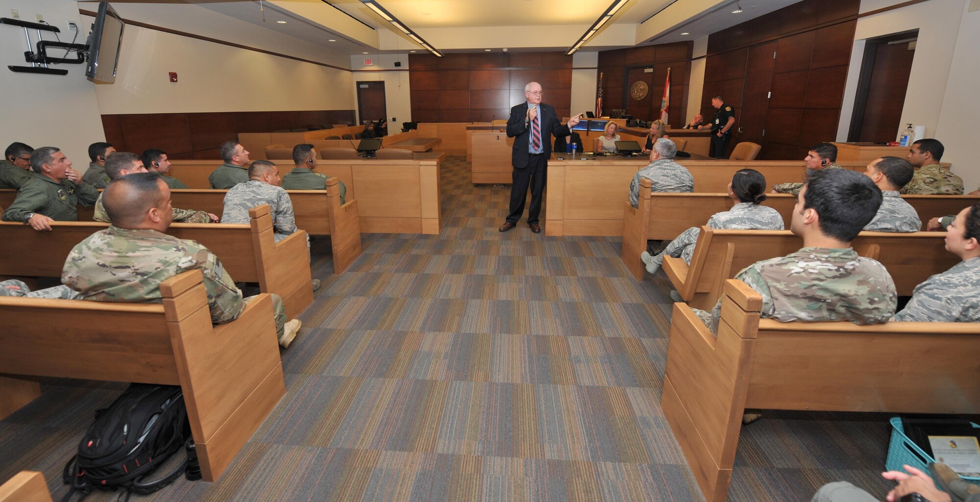 Attendees of the Building Partnership Aviation Capacity Seminar receive briefings from Judge Patt Maney, the county judge for Okaloosa County Court of Florida, at Ft. Walton Beach, Fla.,July 19, 2016. The seminar brought together U.S. and Latin American military represenatives from nine partner nations to learn about each others aviation capabilites and security. 