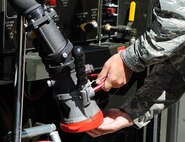 A fuel hose is connected to a B-52H Stratofortress at Minot Air Force Base, N.D., May 2, 2016. Keeping the aircraft fueled is one of the many things Team Minot does to ensure the mission stays successful. (U.S. Air Force photo/Senior Airman Kristoffer Kaubisch)