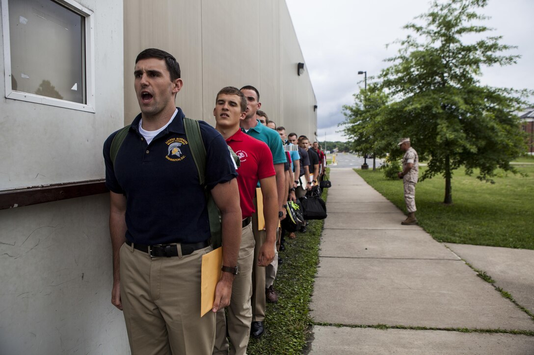 Candidates with Lima & India Company, Officer Candidate School (OCS) arrive at OCS aboard Marine Corps Base Quantico, Va., July 3, 2016. The mission of OCS is to educate and train officer candidates in order to evaluate and screen individuals for qualities required for commissioning as a Marine Corps officer. (U.S. Marine Corps Combat Camera photo by Lance Cpl. Jose Villalobosrocha/Released)