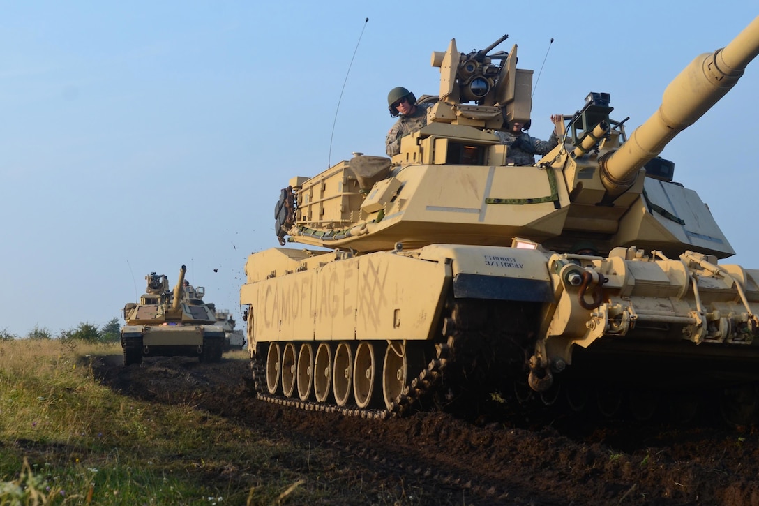Soldiers commence a movement during exercise Saber Guardian 2016 at the Romanian Land Forces Combat Training Center in Cincu, Romania, July 29, 2016. The multinational military exercise involves about 2,800 military personnel from 10 nations including Armenia, Azerbaijan, Bulgaria, Canada, Georgia, Moldova, Poland, Romania, Ukraine and the United States. Army photo by Sgt. Tyler Meister