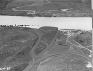 Ice Harbor Lock and Dam upstream of the Tri-Cities on the Lower Snake River celebrated its 50th anniversary of construction by the U.S. Army Corps of Engineers, June 16, 2012 at the dam. It was built from 1956 to 1962 and dedicated by Vice-President Lyndon B. Johnson on May 9, 1962. Corps of Engineers photos. (Looking North, South Shore field office road, access road, connecting road)
