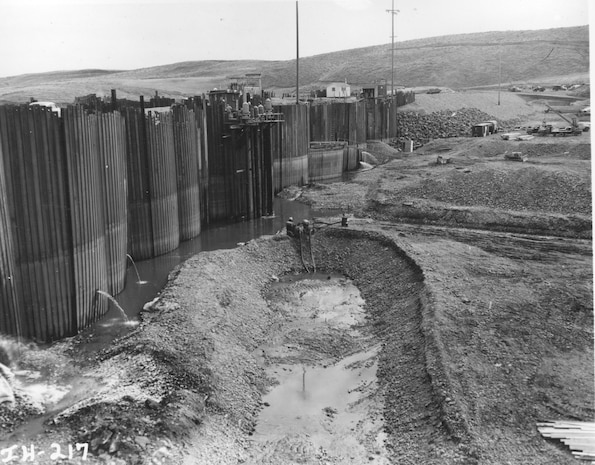 Ice Harbor Lock and Dam upstream of the Tri-Cities on the Lower Snake River celebrated its 50th anniversary of construction by the U.S. Army Corps of Engineers, June 16, 2012 at the dam. It was built from 1956 to 1962 and dedicated by Vice-President Lyndon B. Johnson on May 9, 1962. Corps of Engineers photos. (Cofferdam, Looking Southeast, showing excavation of temporary fish ladder)