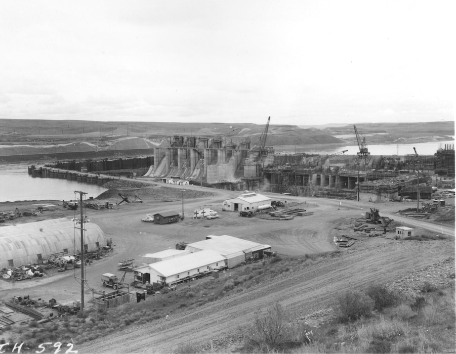 Ice Harbor Lock and Dam upstream of the Tri-Cities on the Lower Snake River celebrated its 50th anniversary of construction by the U.S. Army Corps of Engineers, June 16, 2012 at the dam. It was built from 1956 to 1962 and dedicated by Vice-President Lyndon B. Johnson on May 9, 1962. Corps of Engineers photos. (Looking NE at South shore construction)