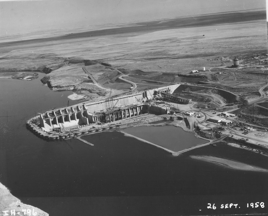 Ice Harbor Lock and Dam upstream of the Tri-Cities on the Lower Snake River celebrated its 50th anniversary of construction by the U.S. Army Corps of Engineers, June 16, 2012 at the dam. It was built from 1956 to 1962 and dedicated by Vice-President Lyndon B. Johnson on May 9, 1962. Corps of Engineers photos. (Looking SE at South shore construction)