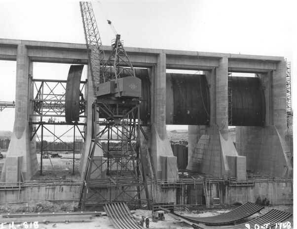 Ice Harbor Lock and Dam upstream of the Tri-Cities on the Lower Snake River celebrated its 50th anniversary of construction by the U.S. Army Corps of Engineers, June 16, 2012 at the dam. It was built from 1956 to 1962 and dedicated by Vice-President Lyndon B. Johnson on May 9, 1962. Corps of Engineers photos. (Spillway gates assembly, looking west)