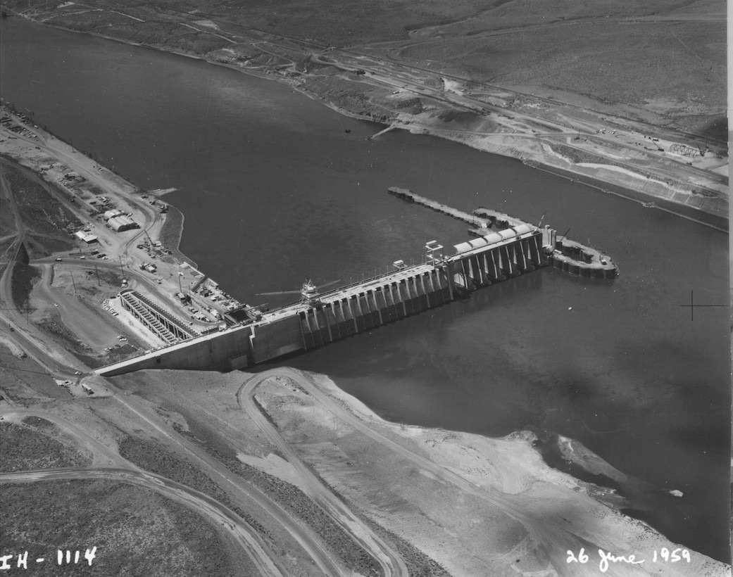 Ice Harbor Lock and Dam upstream of the Tri-Cities on the Lower Snake River celebrated its 50th anniversary of construction by the U.S. Army Corps of Engineers, June 16, 2012 at the dam. It was built from 1956 to 1962 and dedicated by Vice-President Lyndon B. Johnson on May 9, 1962. Corps of Engineers photos. (Looking NW at South shore construction)