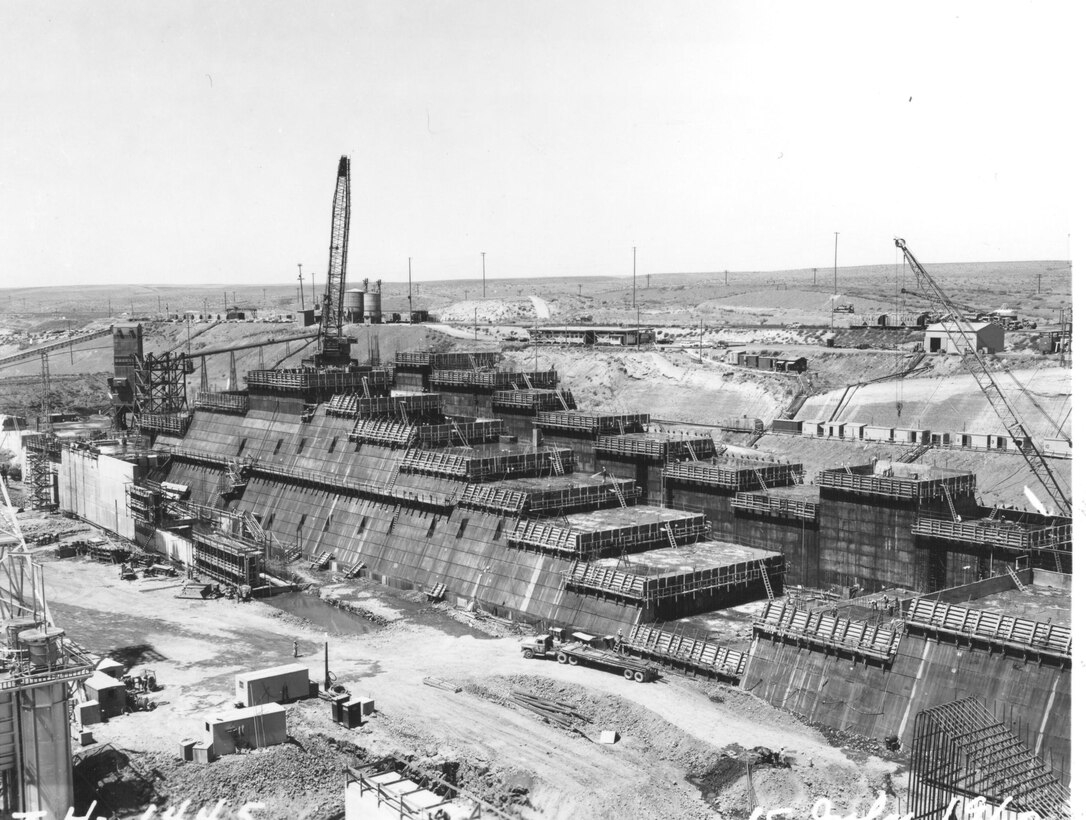 Ice Harbor Lock and Dam upstream of the Tri-Cities on the Lower Snake River celebrated its 50th anniversary of construction by the U.S. Army Corps of Engineers, June 16, 2012 at the dam. It was built from 1956 to 1962 and dedicated by Vice-President Lyndon B. Johnson on May 9, 1962. Corps of Engineers photos. (Lock and north fish ladder construction, looking NW)