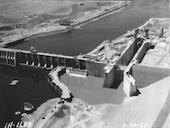 Ice Harbor Lock and Dam upstream of the Tri-Cities on the Lower Snake River celebrated its 50th anniversary of construction by the U.S. Army Corps of Engineers, June 16, 2012 at the dam. It was built from 1956 to 1962 and dedicated by Vice-President Lyndon B. Johnson on May 9, 1962. Corps of Engineers photos. (Looking downstream, lock and spillway)