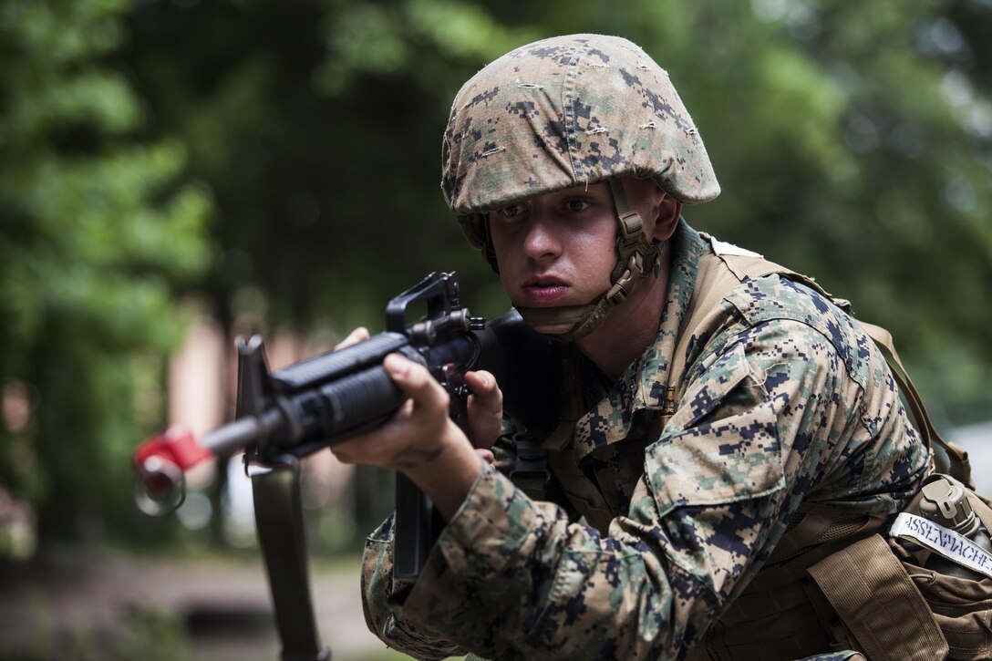A Candidate with India Company, Officer Candidate School (OCS), conducts the Buddy Pair Fire and Movement course aboard Marine Corps Base Quantico, Va., July 12, 2016. The mission of OCS is to educate and train officer candidates in order to evaluate and screen individuals for qualities required for commissioning as a Marine Corps officer. (U.S. Marine Corps Combat Camera photo by Lance Cpl. Jose Villalobosrocha/Released)