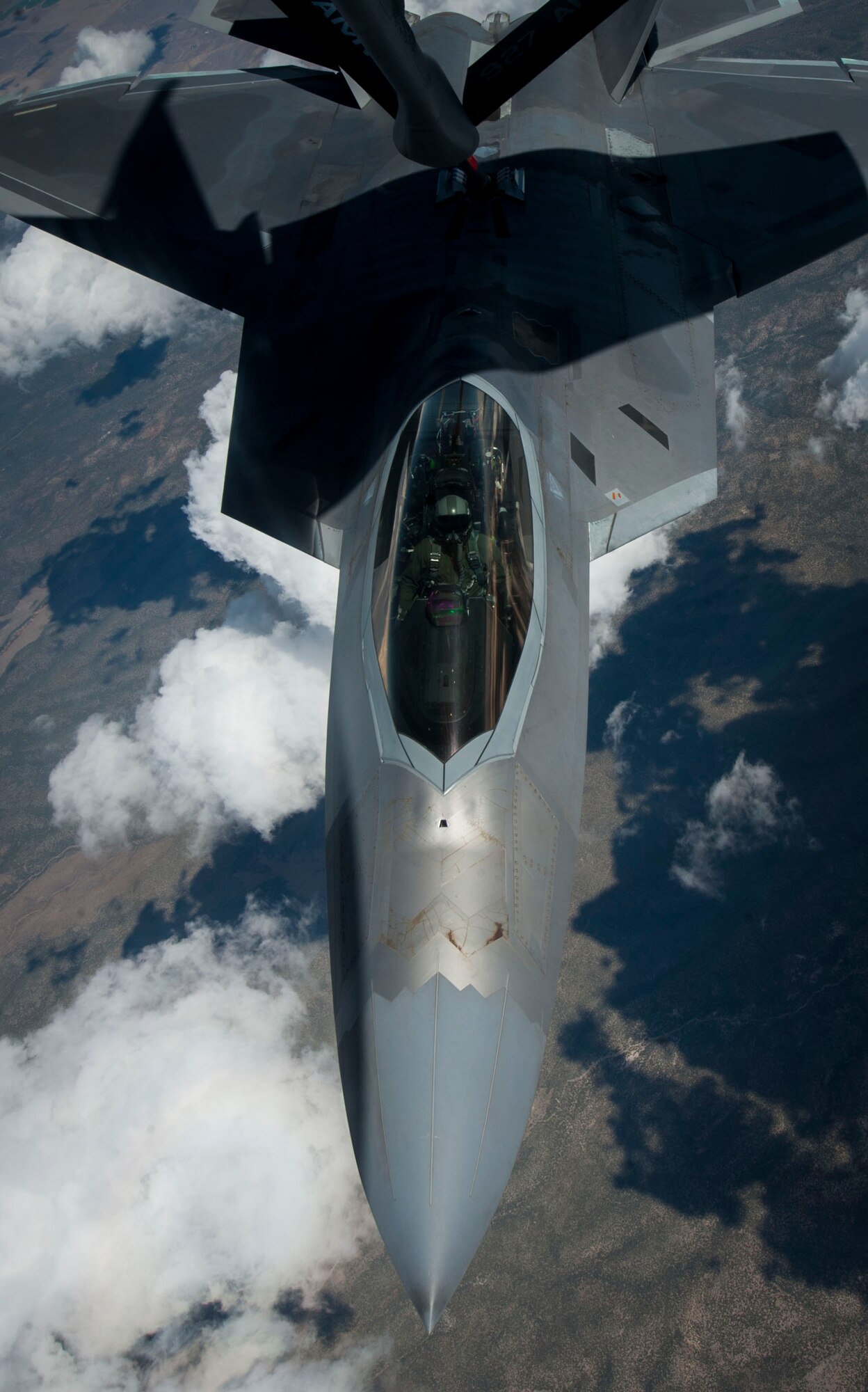 An F-22 Raptor, from Joint Base Langley-Eustis, Va., receives fuel from a KC-135 Stratotanker over the Nevada Test and Training Range during a training sortie during Red Flag 16-3, July 21, 2016. With the F-35B also participating in the exercise, this is the first exercise that both F-22 and F-35 airframes will participate in Red Flag. (U.S. Air Force photo by Senior Airman Jake Carter/Released)