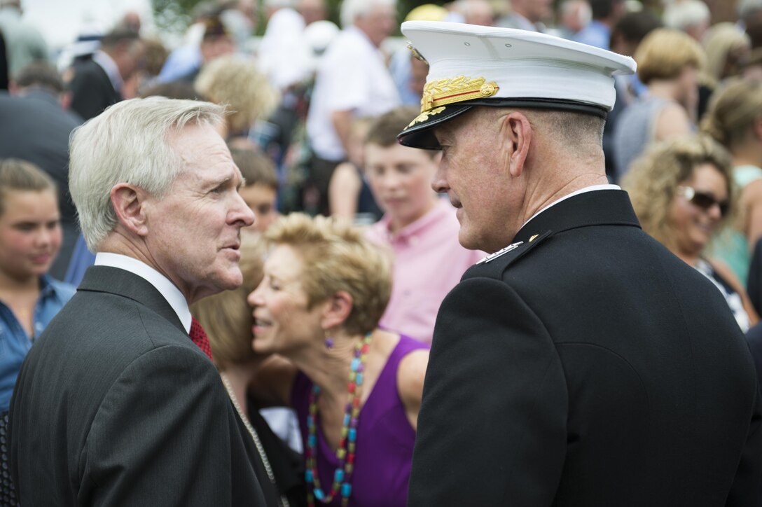 Marine Corps Gen. Joe Dunford, chairman of the Joint Chiefs of Staff, speaks with Navy Secretary Ray Mabus after a naming ceremony for the USS Harvey C. Barnum Jr. at Marine Barracks Washington, D.C., July 28, 2016. DoD photo by Army Sgt. James K. McCann 