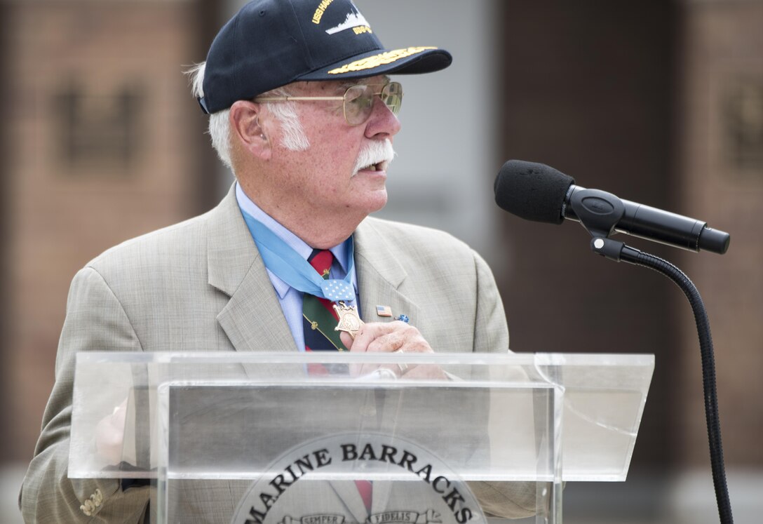 Retired Marine Corps Col. Harvey Barnum, a Vietnam War veteran and Medal of Honor recipient, delivers remarks during a ceremony to name a ship in his honor at Marine Barracks Washington, D.C., July 28, 2016. The USS Harvey C. Barnum Jr. will be an Arleigh Burke-class guided-missile destroyer. DoD photo by Army Sgt. James K. McCann