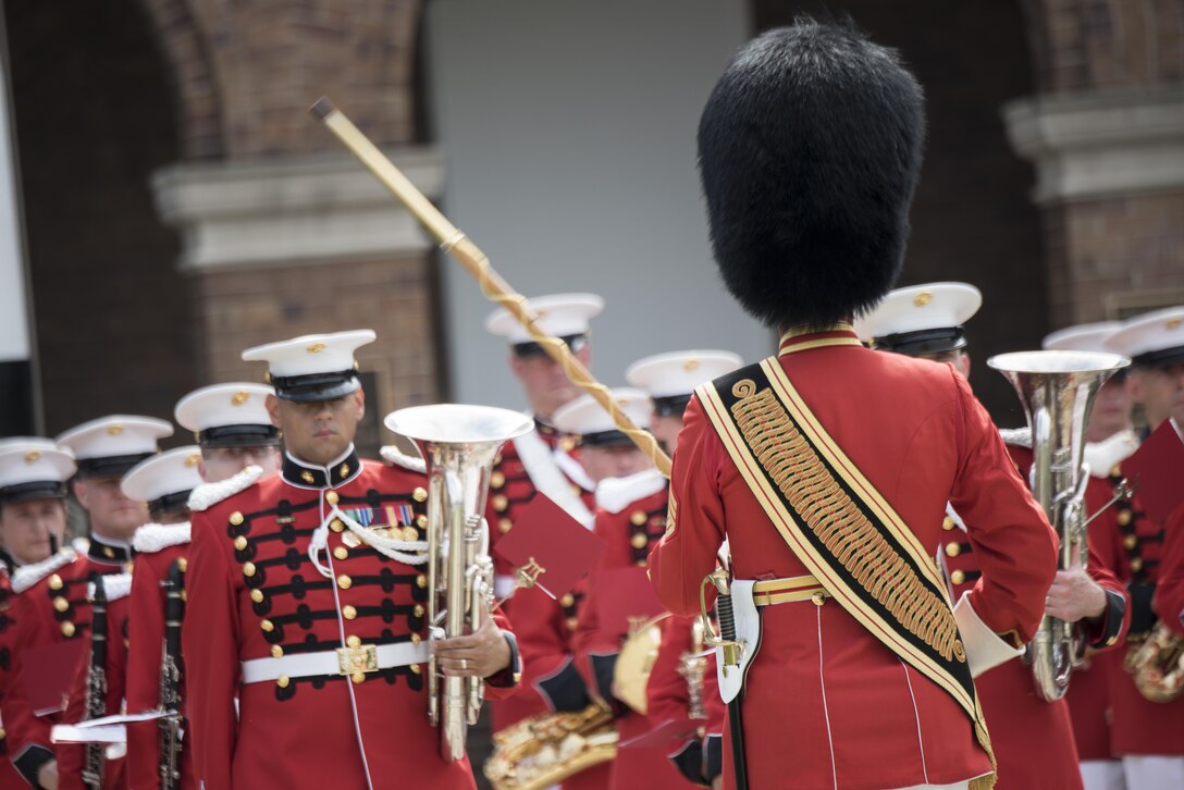 Members of the U.S. Marine Drum and Bugle Corps participate in a naming ceremony for the USS Harvey C. Barnum Jr. at Marine Barracks Washington, D.C., July 28, 2016. DoD photo by Army Sgt. James K. McCann