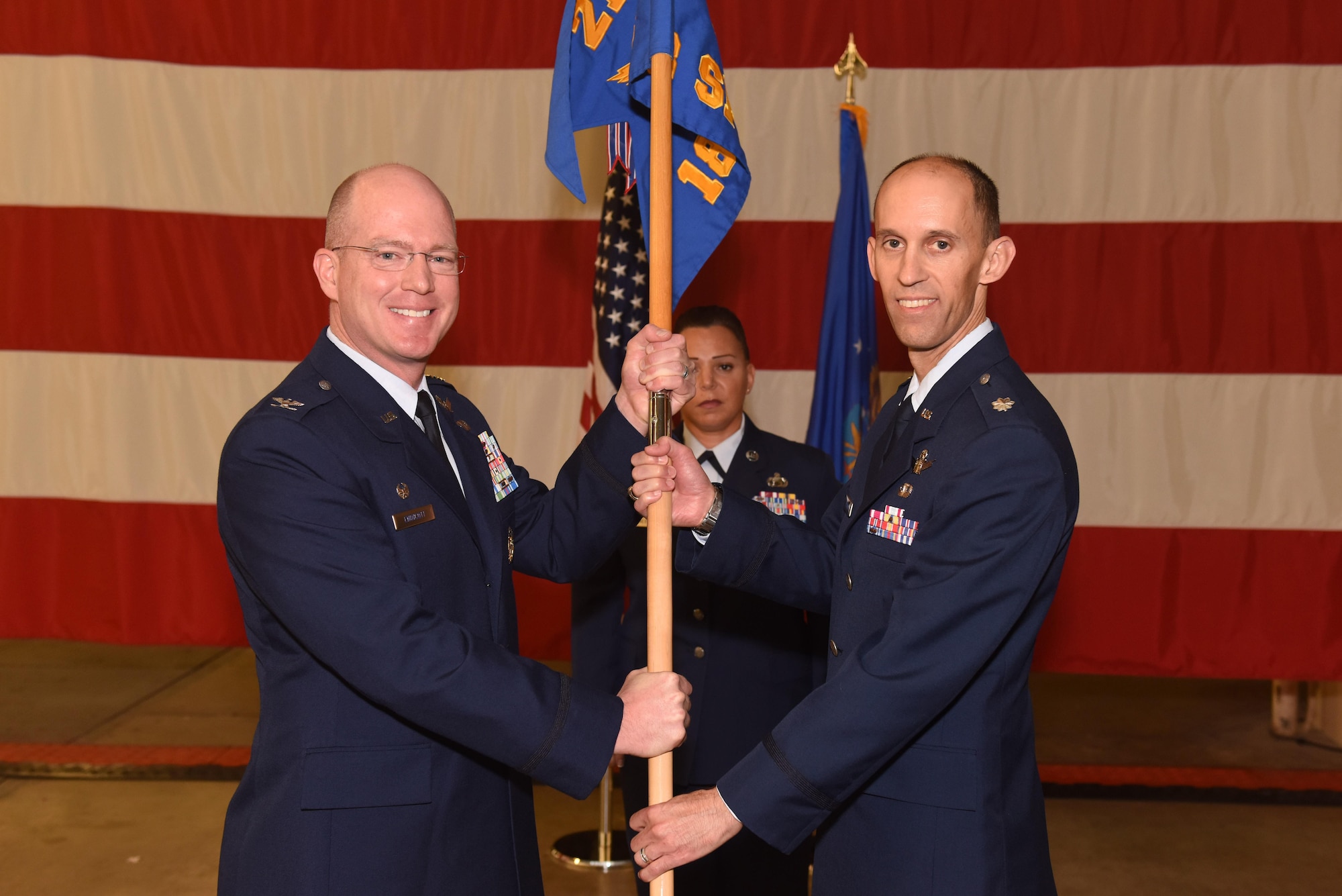 Col. Troy Endicott, 21st Operations Group commander, assigns command of the 18th Space Control Squadron to Lt. Col. Scott Putnam, 18th SPCS commander, during an assumption of command ceremony, July 22, 2016, Vandenberg Air Force Base, Calif. Putnam assumed command of the 18th SPCS, the newest space surveillance unit that will fall under the 21st Space Wing.