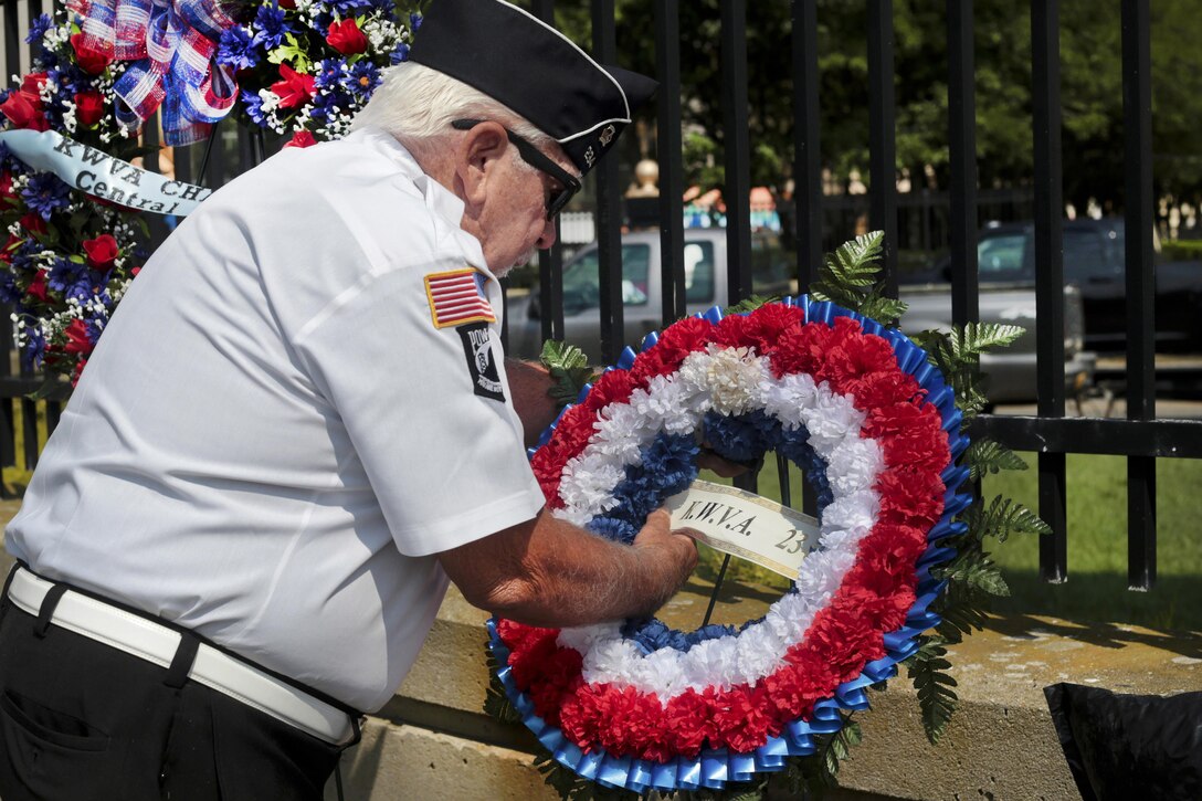 A Korean War veteran prepares a wreath during the National Korean War Veterans Armistice Day event at the New Jersey Korean Veterans War Memorial in Brighton Park, Atlantic City, N.J., July 27, 2016. On July 27, 1953, leaders signed the Korean Armistice Agreement to end the conflict. Air National Guard photo by Tech. Sgt. Matt Hecht