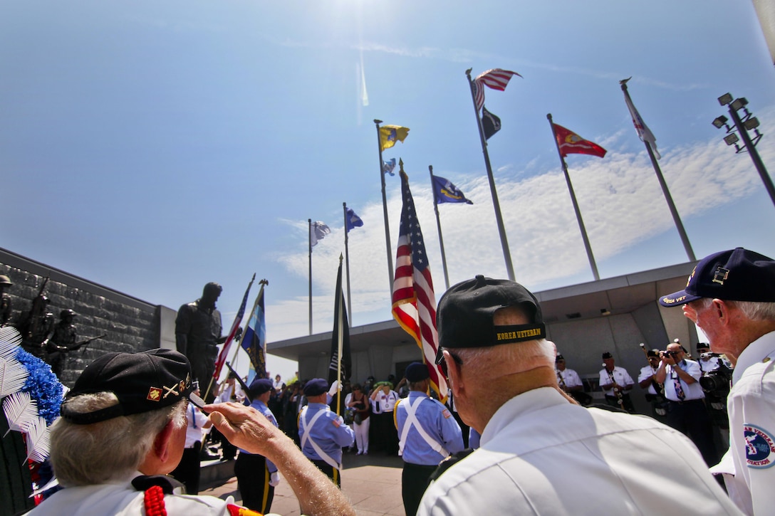 Korean War veterans render honors as a wreath is placed at a monument during the National Korean War Veterans Armistice Day ceremony in Atlantic City, N.J., July 27, 2016. Air National Guard photo by Tech. Sgt. Matt Hecht