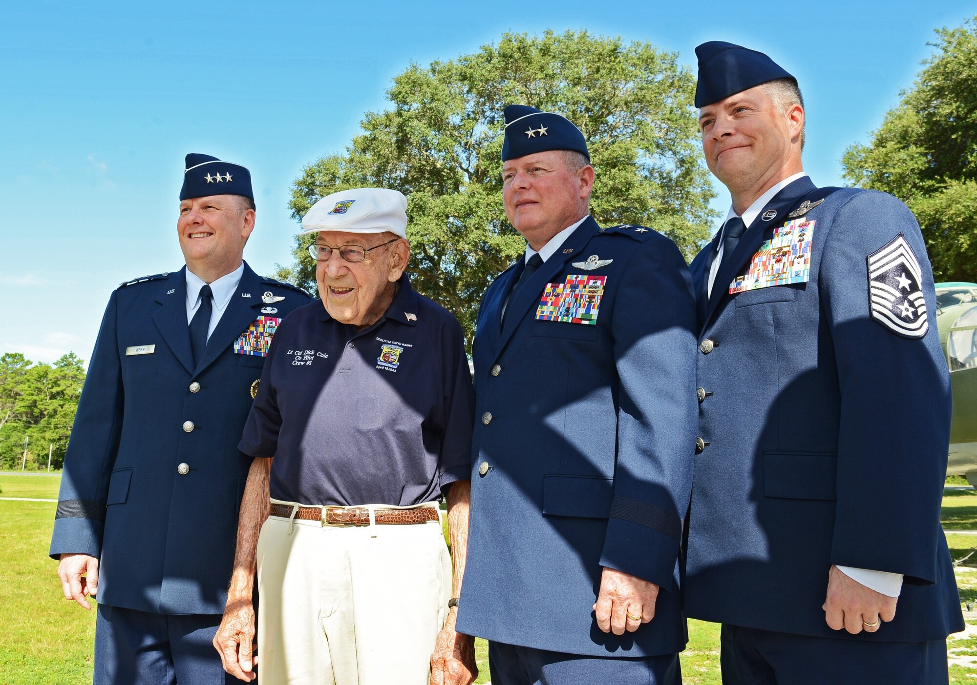Lt. Col. (ret.) Richard “Dick” Cole poses for a photo with Air Force Special Operations Command leadership at the U.S. Air Force Armament Museum on Eglin Air Force Base, Fla., July 30, 2016. (U.S. Air Force photo/Staff Sgt. Melanie Holochwost)