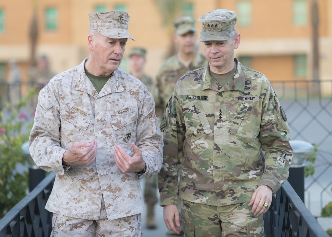 Marine Corps Gen. Joe Dunford, chairman of the Joint Chiefs of Staff, talks with Army Lt. Gen. Sean MacFarland, commander of Combined Joint Task Force Operation Inherent Resolve, at the U.S. Embassy in Baghdad, July 30, 2016. DoD photo by Navy Petty Officer 2nd Class Dominique A. Pineiro