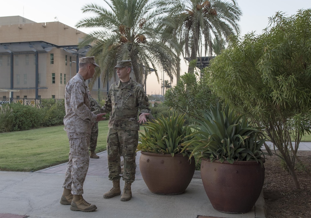 Marine Corps Gen. Joe Dunford, chairman of the Joint Chiefs of Staff, and Army Lt. Gen. Sean MacFarland, commander of Combined Joint Task Force Operation Inherent Resolve, meet in Baghdad, July 30, 2016. DoD photo by Navy Petty Officer 2nd Class Dominique A. Pineiro