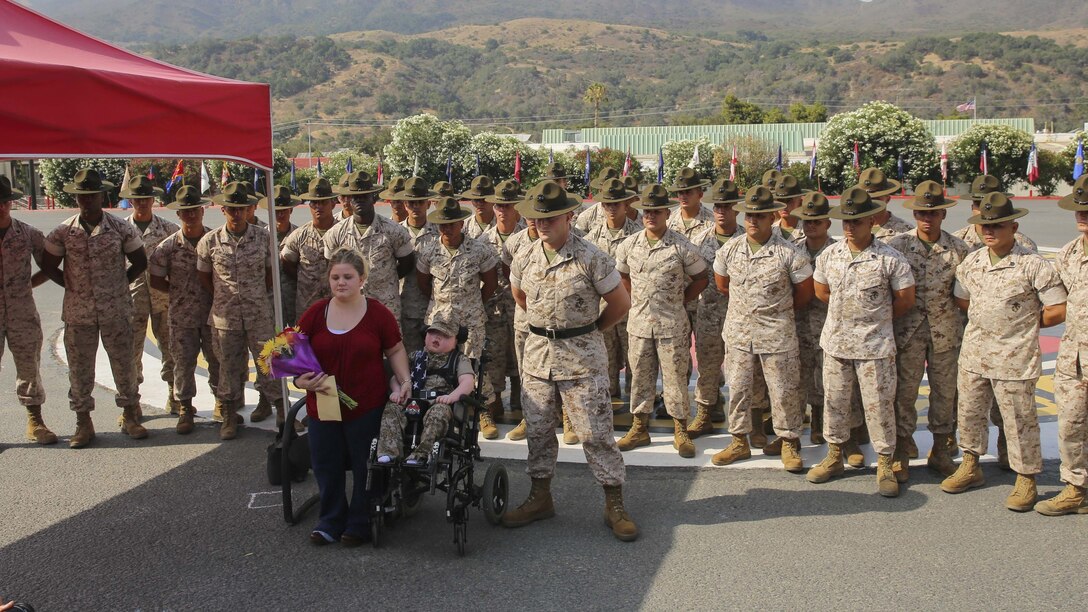 Marine Corps Recruit Depot San Diego, on behalf of the Commandant of the Marine Corps, presented the title of Honorary Marine to Wyatt Seth Gillette in a ceremony at the School of Infantry-West Parade Deck, Marine Corps Base Camp Pendleton, Calif., Saturday July 30, 2016, at 9 a.m. 

Wyatt was born on Aug. 15, 2008, and diagnosed with Aicardi-Goutieres Syndrome Type 1 (Trex 1 Mutation) when he was four years old.  The disorder mainly affects the brain, the immune system and the skin and causes secondary medical problems such as leukodystrophy, seizures, type 1 diabetes, cerebral palsy, hypertension and adrenal insufficiency. 

Wyatt's father, SSgt. Jeremiah Gillette, is currently a drill instructor with 2nd Battalion, Recruit Training Regiment, aboard the Depot.



Wyatt is only the 96th recipient of the award since the program's inception in 1992.