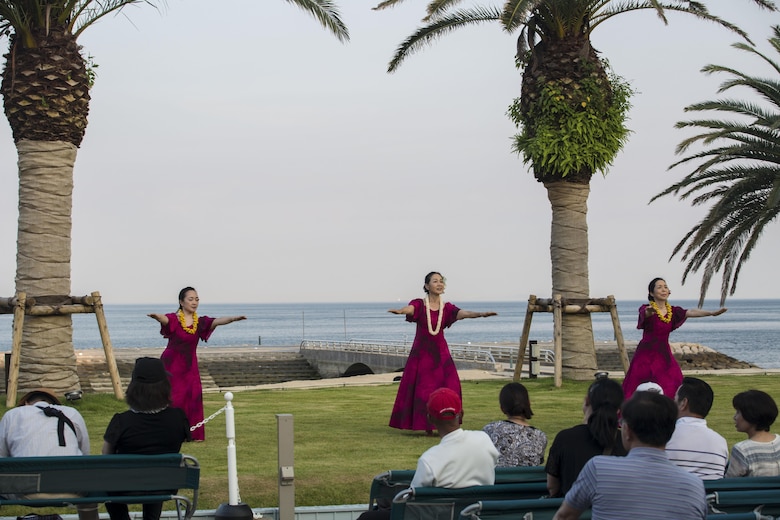 Hula dancers perform for the residents of Marine Corps Air Station Iwakuni and Oshima Islanders during the U.S. – Japan Luau Party on Oshima Island, Japan, July 23, 2016. Marines were able to experience a new part of Japan while celebrating the island’s history and friendship with U.S. (U.S. Marine Corps photo by Cpl. Nathan Wicks)