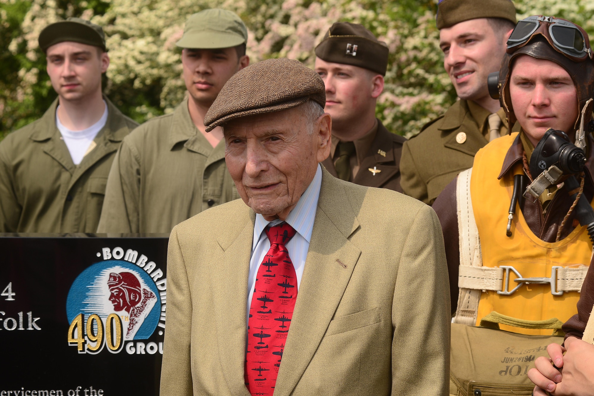 92-year-old veteran Si Spiegel, poses for photographs with Airmen from the 48th Fighter Wing May 29, in the village of Brome, England. Spiegel flew 35 missions with the 490th Bomb Group and is believed to be the last surviving member of the unit. (U.S. Air Force photo/ Tech Sgt. Matthew Plew)