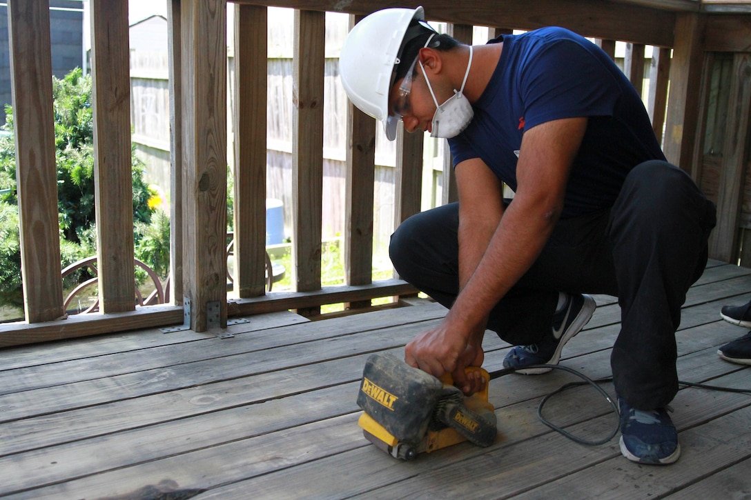 Recruiting Station New York Marines and Poolees volunteer to assist Habitat for Humanity, a non-profit organization that repairs and builds homes for the less fortunate, in repairing a two-story home on Coney Island in Brooklyn, NY, that was damaged during Hurricane Sandy in 2013.