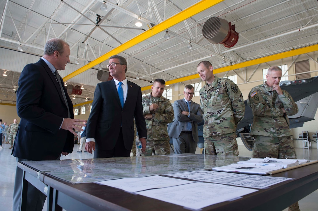 Defense Secretary Ash Carter listens to a colleague during a tour of the airfield at Fort Huachuca, Ariz., May 31, 2016. DoD photo by Navy Petty Officer 1st Class Tim D. Godbee