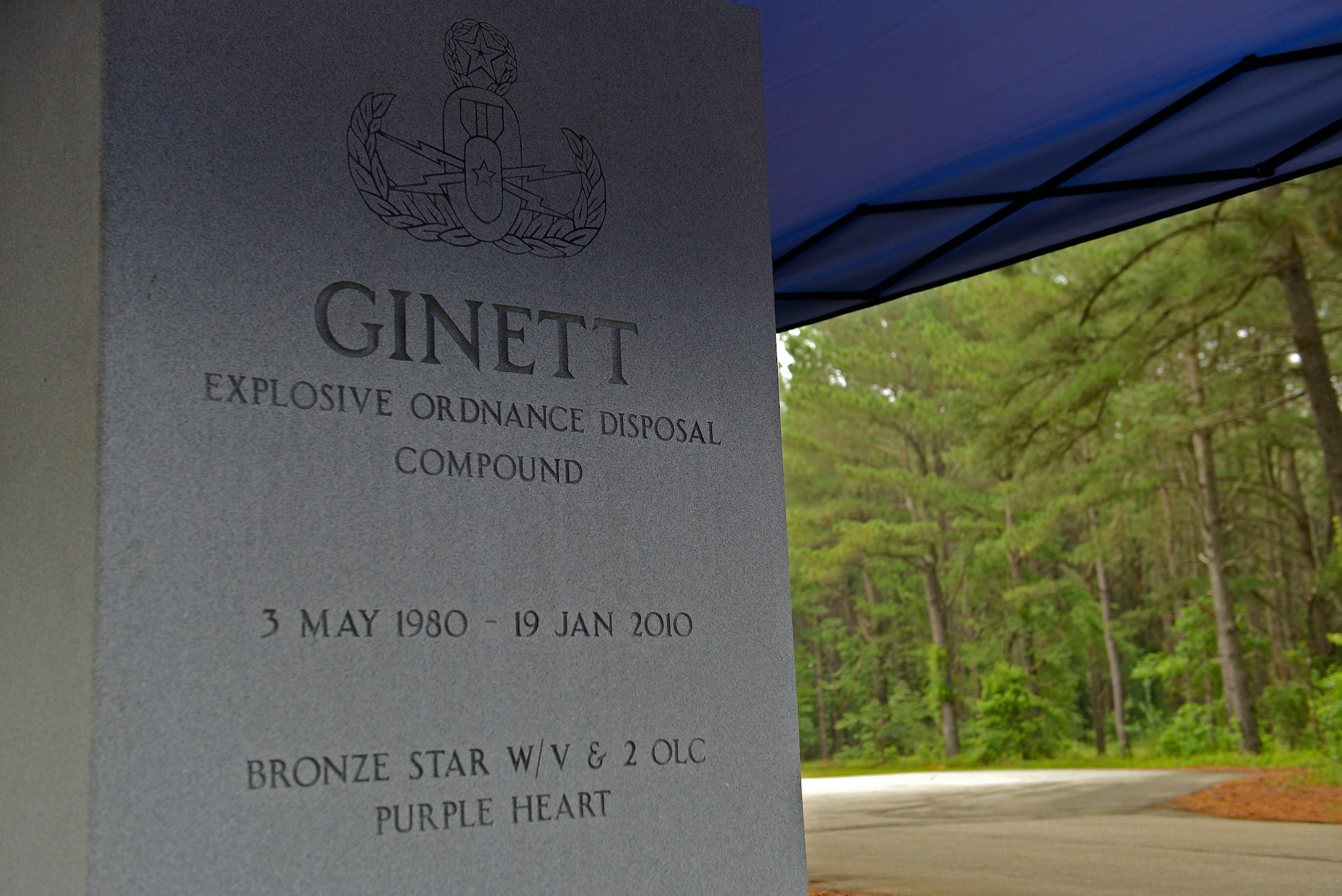 The Tech. Sgt. Adam Ginett Explosive Ordnance Disposal Compound at Shaw Air Force Base, S.C., May 20, 2016 was commemorated to honor Ginett, a former 20th Civil Engineer Squadron EOD technician. Ginett was stationed at Shaw from 2004-2007, and was killed in action Jan. 19, 2010. (U.S. Air Force photo by Airman 1st Class Christopher Maldonado)