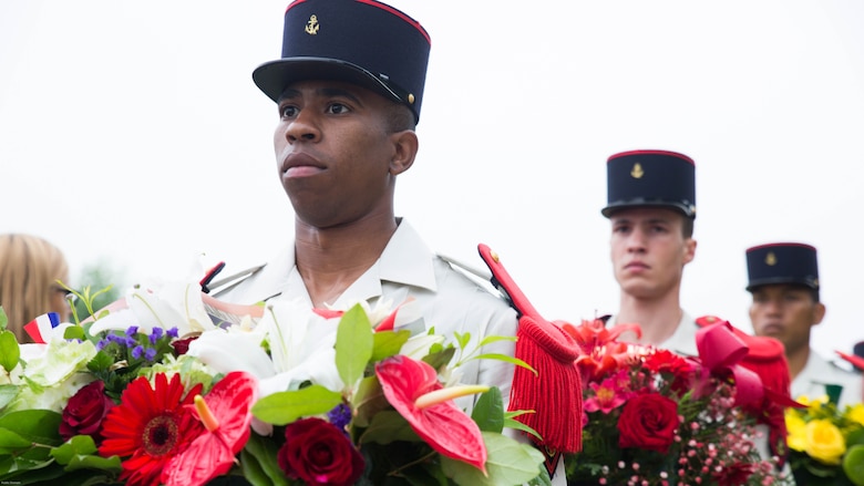 French soldiers carry wreaths during a Memorial Day ceremony in which U.S. Marines performed alongside the French Army at the Aisne-Marne American Memorial Cemetery in Belleau, France, May 29, 2016. The French and the Americans gathered together, as they do every year, to honor those service members from both countries who have fallen in WWI, Belleau Wood and throughout history, fighting side by side. The Marines also remembered those they lost in the Battle of Belleau Wood 98 years ago.