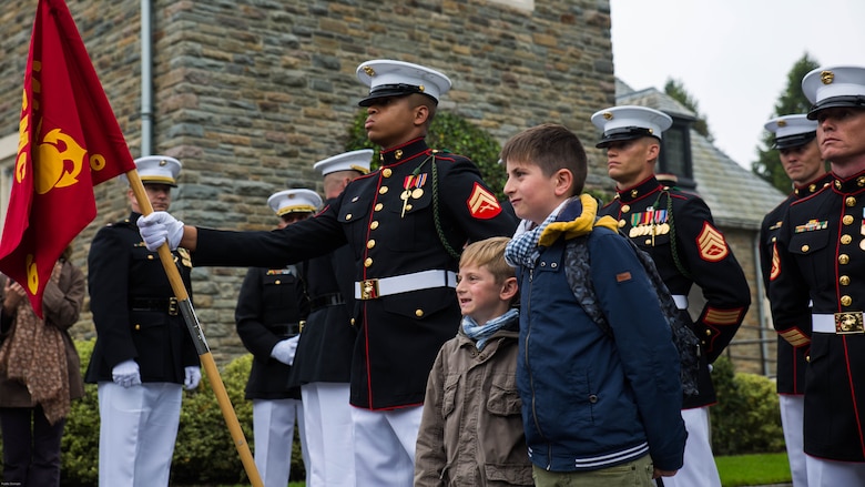 Guests take pictures with Marines from 6th Marine Regiment, 2nd Marine Division during a Memorial Day ceremony in which U.S. Marines performed alongside the French Army at the Aisne-Marne American Memorial Cemetery in Belleau, France, May 29, 2016. The French and the Americans gathered together, as they do every year, to honor those service members from both countries who have fallen in WWI, Belleau Wood and throughout history, fighting side by side. The Marines also remembered those they lost in the Battle of Belleau Wood 98 years ago.