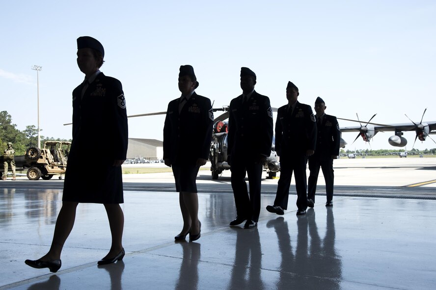 Moody’s First Sergeant Association performs a tribute to U.S. Air Force Chief Master Sgt. David Kelch, 23d Wing command chief, during his retirement ceremony at Moody Air Force Base, Ga., May 26, 2016. Kelch served as a first sergeant for six of his more than 29-year Air Force career. (U.S. Air Force photo by Airman 1st Class Janiqua P. Robinson/Released)