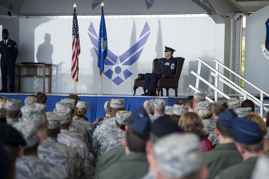 U.S. Air Force Chief Master Sgt. David Kelch, 23d Wing command chief, listens as Brig. Gen. Chad Franks, senior executive officer to the Air Force vice chief of staff, gives his remarks during a retirement ceremony at Moody Air Force Base, Ga., May 26, 2016. Franks thanked Kelch for all his hard work and dedication during their time working together at the 23d WG.. (U.S. Air Force photo by Airman 1st Class Janiqua P. Robinson/Released)
