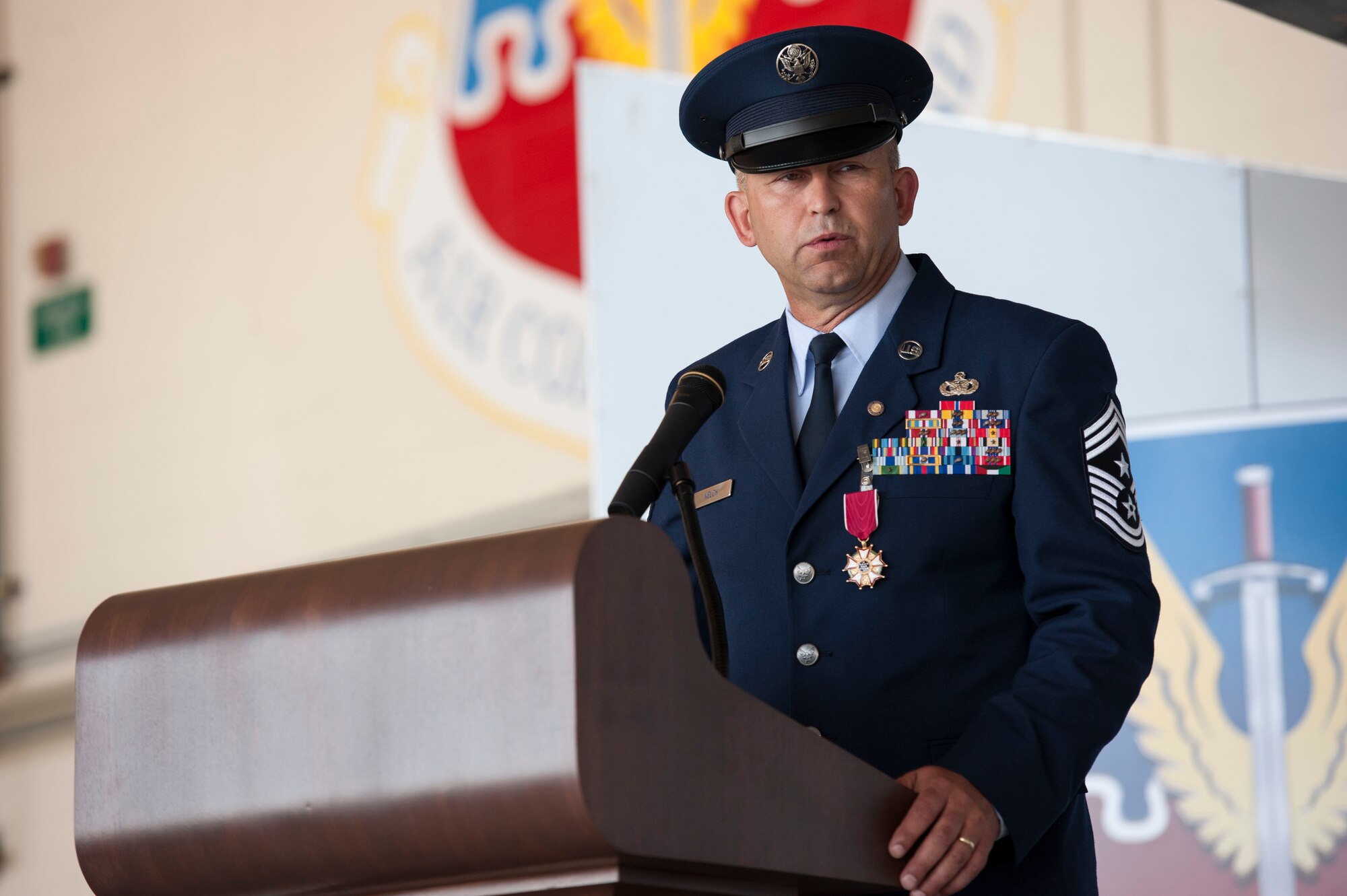 U.S. Air Force Chief Master Sgt. David Kelch, 23d Wing command chief, addresses the crowd during his retirement ceremony at Moody Air Force Base, Ga., May 26, 2016. Kelch, a Montana native, is retiring after 29 years and seven months of military service. (U.S. Air Force photo by Andrea Jenkins/Released)