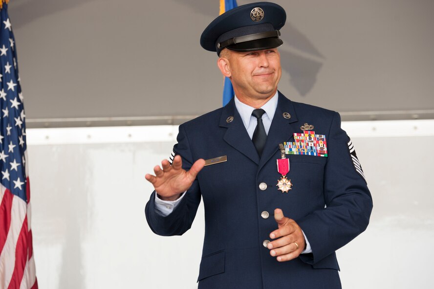 U.S. Air Force Chief Master Sgt. David Kelch, 23d Wing command chief, thanks the men and women of the 23d WG during his retirement ceremony at Moody Air Force Base, Ga., May 26, 2016. Kelch, who has served as the 23d WG command chief since July of 2014, retired after 29 years and seven months of military service. (U.S. Air Force photo by Andrea Jenkins/Released)