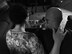 U.S. Air Force Staff Sgt. Lauren Palmer, a 509th Aircraft Maintenance Squadron commander support staff personnel craftsman, left, and her husband, David Roberts, look at old photos May 13, 2016. The couple reminisced on memories from before Lauren was diagnosed with Hodgkin’s lymphoma in October 2014. (U.S. Air Force photo by Airman 1st Class Michaela R. Slanchik)