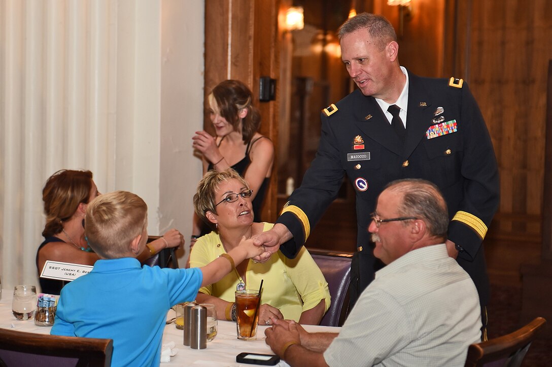 Army Reserve Brig. Gen. Fredrick R. Maiocco Jr., commanding officer of the 85th Support Command, shakes hands with a Gold Star family during the city of Chicago’s Memorial Day commemoration, May 28, 2016. Maiocco attended the Gold Star Families breakfast held in the Macy’s building in downtown Chicago that preceded Chicago’s Memorial Day ceremony and parade.  
(U.S. Army photo by Sgt. Aaron Berogan/Released)