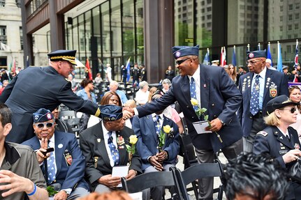 United States Army Reserve Brig. Gen. Frederick R. Maiocco Jr., Commanding General, 85th Support Command, shakes hands with a Tuskegee Airmen at the Richard J. Daley Plaza before a wreath laying ceremony, May 28, 2016. More than 100,000 attended the Memorial Day ceremony and parade held in Chicago.
(U.S. Army photo by Sgt. Aaron Berogan/Released)