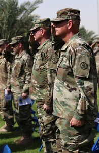 Soldiers salute the flag during the Memorial Day service hosted by U.S. Army Central and the Area Support Group – Kuwait on May 30, 2016 at Camp Arifjan, Kuwait. The ceremony brings the Camp Arifjan community together to honor fallen Servicemembers. (Photo by Spc. Angela Lorden/Released)