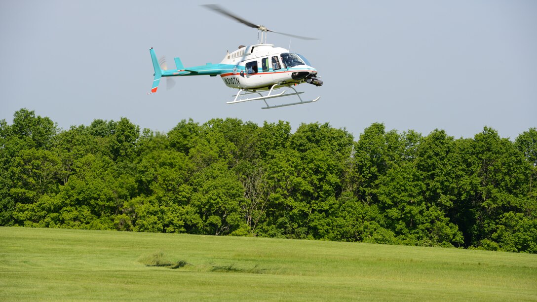 Aurora flight sciences tests the Autonomous Aerial Cargo/Utility System on a Bell 206 helicopter in Bealeton, Virginia, May 25, 2016. The AACUS system is designed to quickly detach and attach to various different aircraft the Marine Corps uses to help with mission accomplishment. 
