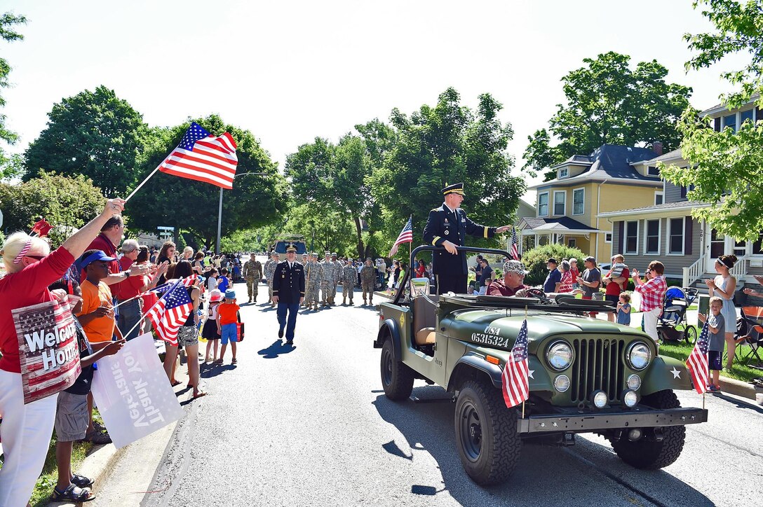 Army Reserve Brig. Gen. Frederick R. Maiocco Jr., Commanding General, 85th Support Command, waves from a World War II era jeep during the Arlington Heights Memorial Day Parade, May 30, 2016.
(US Army Photo by Sgt. Aaron Berogan/Released)