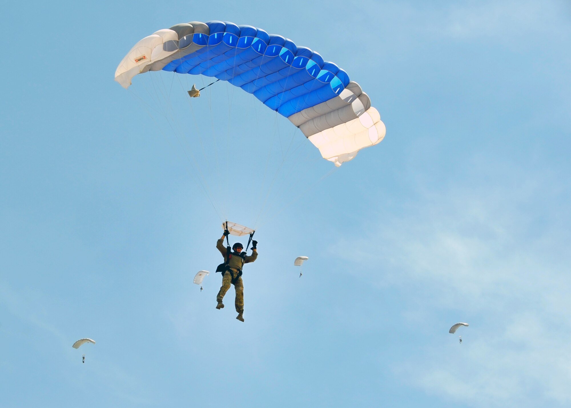 A U.S. Air Force Reserve combat rescue officer from the 306th Rescue Squadron descends in Eloy, Ariz., May 14. Combat rescue officers, also known as CROs, are part of an elite combat force of Guardian Angels specifically organized, trained, equipped and postured to conduct full spectrum personnel recovery to include both conventional and unconventional combat rescue operations. These battlefield Airmen are the most highly trained and versatile personnel recovery specialists in the world. (U.S. Air Force photo by Tech. Sgt. Carolyn Herrick)