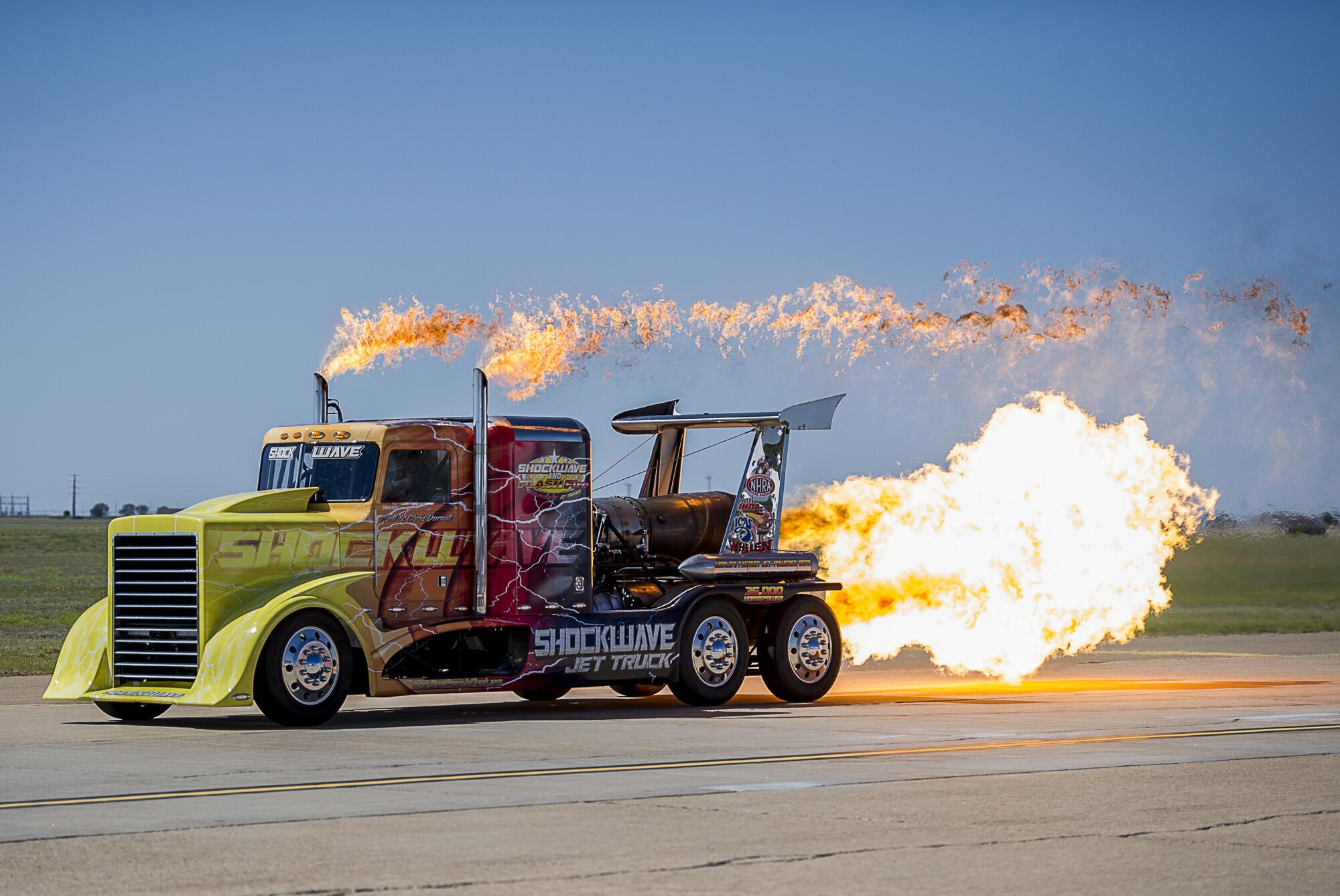 The Shockwave Jet Truck speeds down the flight line taxi way during the Cannon Air Show May 28, 2016, at Cannon Air Force Base, N.M. The 2016 Cannon Air Show highlights the unique capabilities and qualities of Cannon's Air Commandos and also celebrates the long-standing relationship between the 27th Special Operations Wing and the High Plains community. (U.S. Air Force photo/Staff Sgt. Eboni Reams)