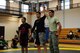 Staff Sgt. Robert Segovia, 50th Civil Engineer Squadron, is declared the winner during the National Police Week Ground Combatives Tournament held on Peterson Air Force Base, Colorado, May 17, 2016. Segovia won both matches in his weight class of 135-145 lbs. and brought home the gold for Team Schriever. (U.S. Air Force photo/Staff Sgt. Amber Grimm)